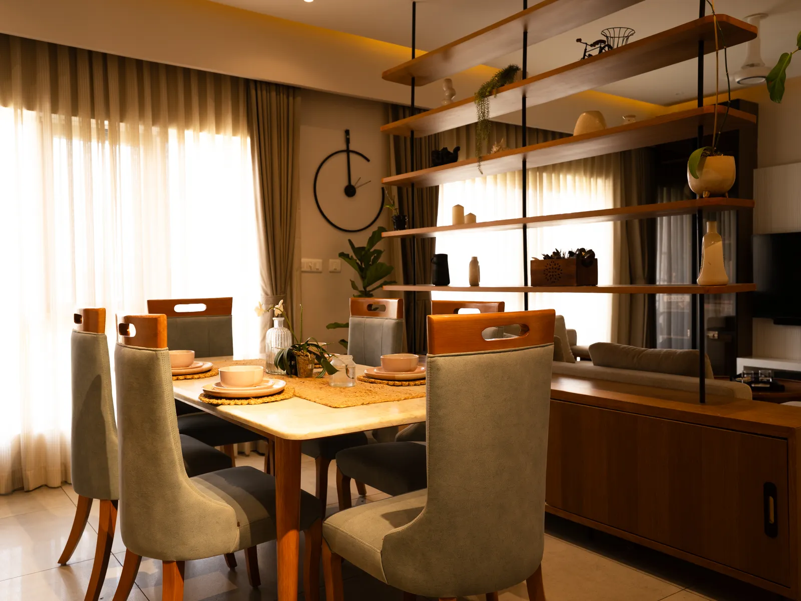 Dining area with suspended shelving and grey chairs — Amlan's Residence